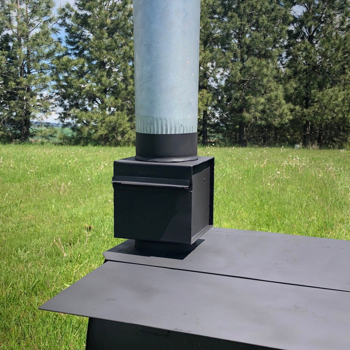 Spark arrestor with pipe inserted.